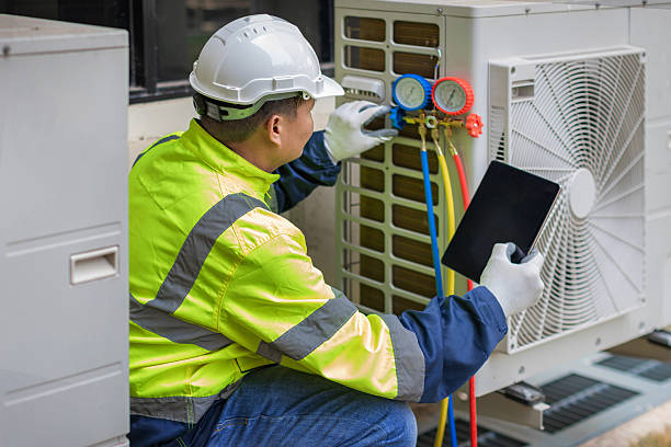 Professional Heat Pump Repair technician working in Bristol, FL